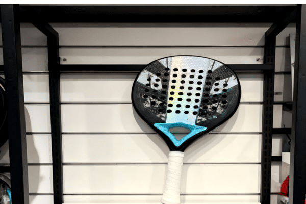 Modern padel racket displayed on store shelf